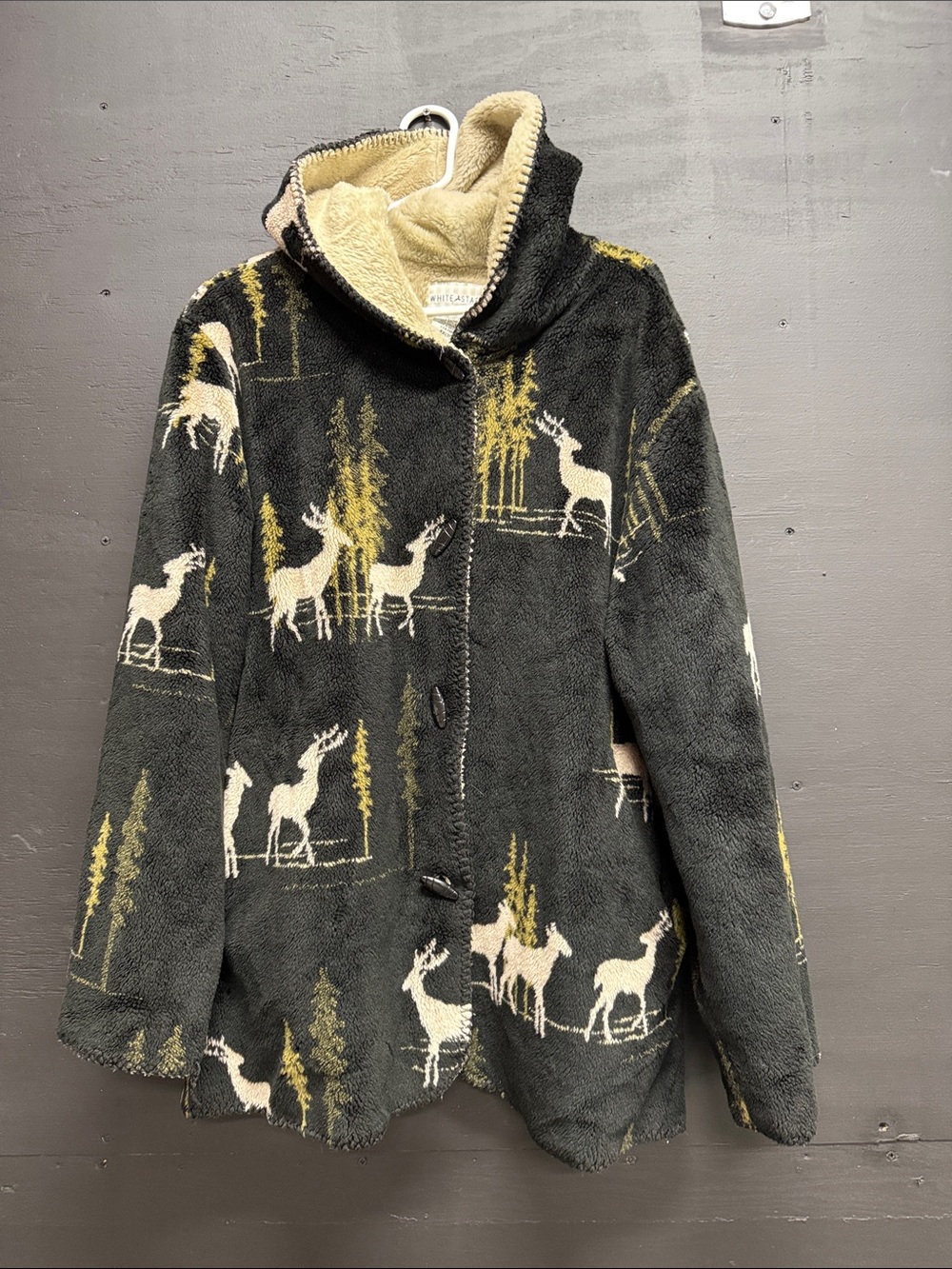 White Stag Black Fleece Puffer Jacket with Cream Deer Motif